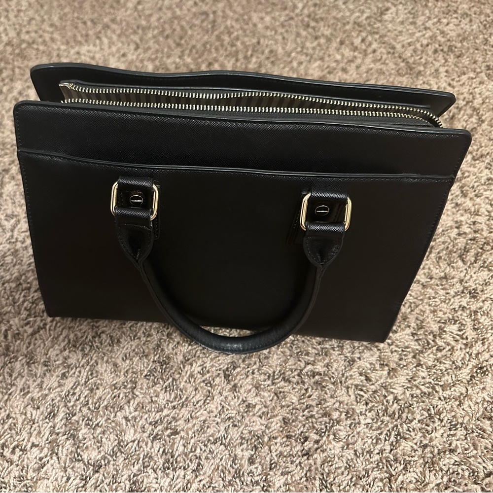 Black with gold hardware Small/Medium sized bag.